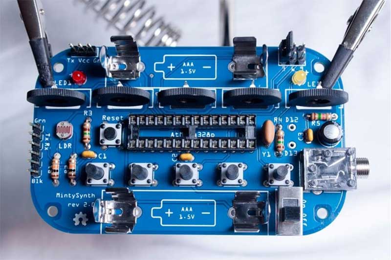 snap the four battery clips in place and solder them